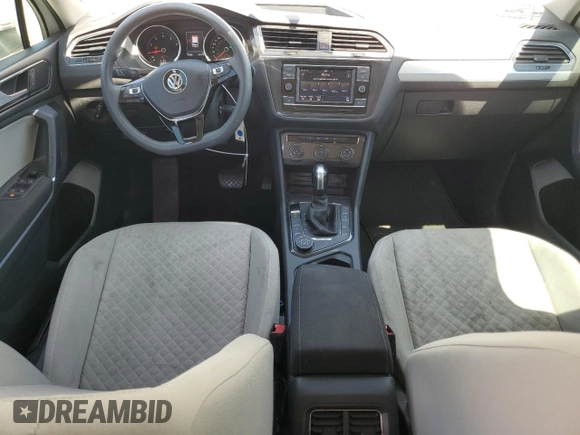 2018 Volkswagen Tiguan S with VIN 3VV0B7AX7JM065958, listed as a Copart auction lot 57598015 with 97,360 mi miles and Salvage title. Bid and sale history available at DreamBid. Image 8.