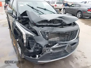 2020 Cadillac XT4 AWD Premium Luxury with VIN 1GYFZDR47LF122394, listed as a IAAI auction lot 41703115 with 69,366 mi miles. Bid and sale history available at carsss.com. Image 6.