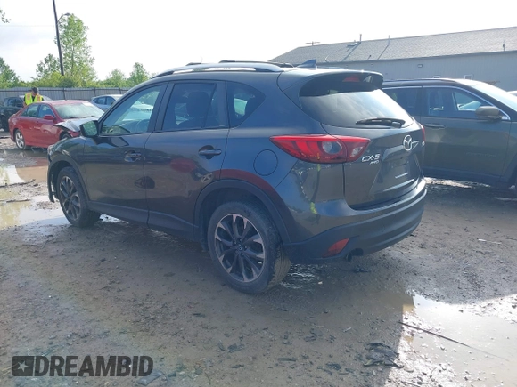 2016 Mazda CX-5 Grand Touring with VIN JM3KE4DYXG0724183, listed as a IAAI auction lot 42176009 with 152,695 mi miles and . Bid and sale history available at DreamBid. Image 3.