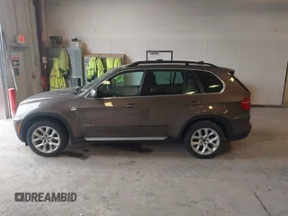 2013 BMW X5 xDrive35i z VIN 5UXZV4C54D0B21144, wystawiony jako IAAI lot #42304165 z przebiegiem 164 673 mil mil oraz . Historia ofert i sprzedaży dostępna na DreamBid. Obrazek 14.