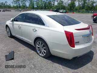 2013 Cadillac XTS Luxury with VIN 2G61P5S38D9160016, listed as a IAAI auction lot 42192602 with 134,879 mi miles and . Bid and sale history available at DreamBid. Image 3.