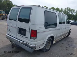 1999 Ford Econoline Cargo with VIN 1FDRE14WXXHB72976, listed as a IAAI auction lot 37688871 with 135,319 mi miles. Bid and sale history available at carsss.com. Image 4.