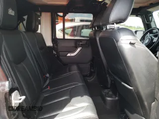 2013 Jeep Wrangler Unlimited Rubicon 10th Anniversary with VIN 1C4HJWFGXDL543660, listed as a Copart auction lot 61462104 with 115,897 mi miles and Salvage title. Bid and sale history available at DreamBid. Image 11.