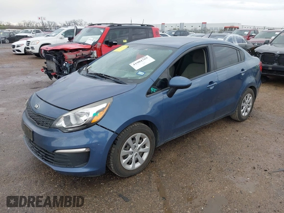 2016 Kia Rio LX with VIN KNADM4A38G6688646, listed as a IAAI auction lot 41904765 with 99,780 mi miles and . Bid and sale history available at DreamBid. Image 2.