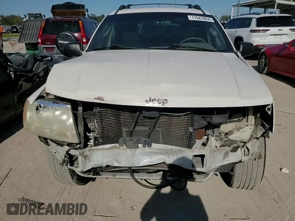 2002 Jeep Grand Cherokee Limited with VIN 1J4GX58S32C320843, listed as a Copart auction lot 77663864 with 289,537 mi miles and Salvage Title. Bid and sale history available at DreamBid. Image 12.