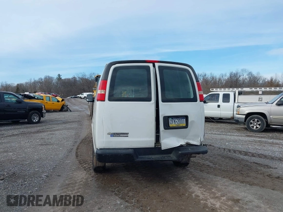 2014 Chevrolet Express Cargo Van with VIN 1GCWGFCA2E1148147, listed as a IAAI auction lot 41101132 with 110,648 mi miles. Bid and sale history available at carsss.com. Image 6.