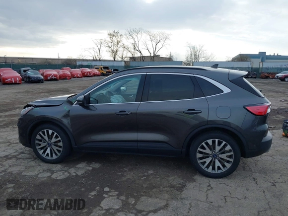 2020 Ford Escape Titanium Hybrid с VIN 1FMCU9DZ2LUB92948, выставлен на аукционе IAAI как лот 41886609 с пробегом Не указан миль и . История ставок и продаж доступна на DreamBid. Изображение 15.