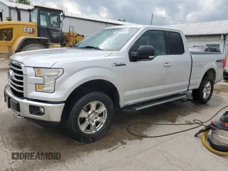 2015 Ford F-150 XLT with VIN 1FTFX1EFXFKE58005, listed as a Copart auction lot 60031575 with 290,212 mi miles and Salvage title. Bid and sale history available at DreamBid. Image 1.