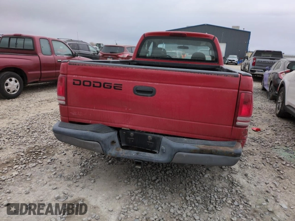 2001 Dodge Dakota z VIN 1B7GL22X41S256594, wystawiony jako Copart lot #43012935 z przebiegiem 217 179 mil mil oraz Szkoda całkowita • Salvage title. Historia ofert i sprzedaży dostępna na DreamBid. Obrazek 6.