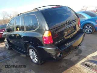 2006 GMC Envoy Denali with VIN 1GKET63M962355586, listed as a IAAI auction lot 41881023 with 235,506 mi miles. Bid and sale history available at carsss.com. Image 3.