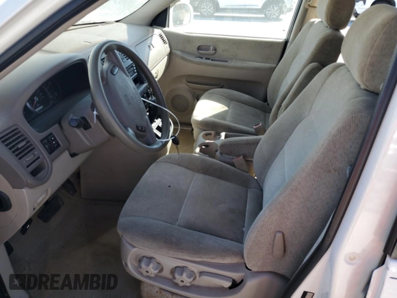 2004 Kia Sedona LX with VIN KNDUP131046585706, listed as a Copart auction lot 74973304 with 107,130 mi miles and Salvage Title. Bid and sale history available at carsss.com. Image 7.