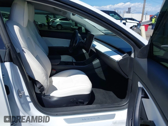2019 Tesla Model 3 Mid Range with VIN 5YJ3E1EA5KF327181, listed as a IAAI auction lot 41860943 with 157,335 mi miles and . Bid and sale history available at DreamBid. Image 5.