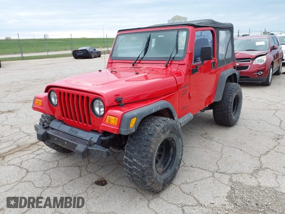 2000 Jeep Wrangler Sport with VIN 1J4FA49S7YP713672, listed as a IAAI auction lot 41924814 with 172,688 mi miles. Bid and sale history available at carsss.com. Image 2.