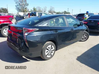 2017 Toyota Prius Two with VIN JTDKARFU1H3039405, listed as a IAAI auction lot 41834929 with 133,948 mi miles and . Bid and sale history available at DreamBid. Image 4.