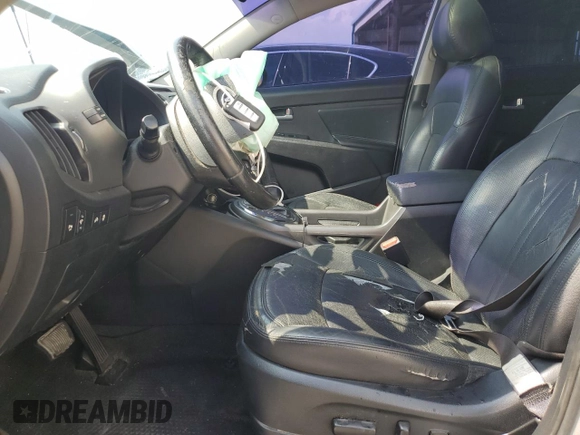 2012 Kia Sportage EX with VIN KNDPC3A21C7185453, listed as a Copart auction lot 56322245 with 142,410 mi miles and Salvage title. Bid and sale history available at DreamBid. Image 7.
