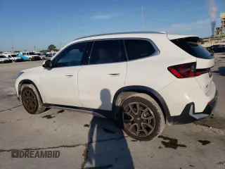 2025 BMW X1 xDrive28i with VIN WBX73EF08S5034108, listed as a Copart auction lot 49151215 with 5,043 mi miles and Salvage Title. Bid and sale history available at carsss.com. Image 2.