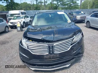 2017 Lincoln MKC Premiere with VIN 5LMCJ1C90HUL52132, listed as a IAAI auction lot 42611380 with 141,981 mi miles and . Bid and sale history available at DreamBid. Image 12.