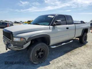 1999 Dodge 2500 with VIN 3B7KF2365XG173781, listed as a Copart auction lot 58275265 with 225,889 mi miles and Salvage title. Bid and sale history available at DreamBid. Image 1.