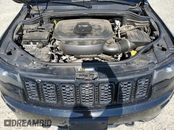 2018 Jeep Grand Cherokee Altitude z VIN 1C4RJFAG7JC382501, wystawiony jako Copart lot #59394445 z przebiegiem 59 143 mil mil oraz Szkoda całkowita • Salvage title. Historia ofert i sprzedaży dostępna na DreamBid. Obrazek 12.