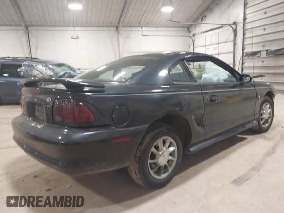 1997 Ford Mustang with VIN 1FALP4041VF157548, listed as a IAAI auction lot 39894591 with 146,891 mi miles. Bid and sale history available at carsss.com. Image 4.