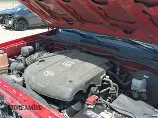 2014 Toyota Tacoma with VIN 3TMLU4EN1EM164374, listed as a IAAI auction lot 42713470 with 117,653 mi miles and . Bid and sale history available at DreamBid. Image 19.