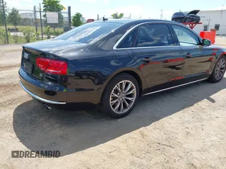 2011 Audi A8 with VIN WAURVAFD6BN005425, listed as a IAAI auction lot 42623409 with 264,365 mi miles and . Bid and sale history available at DreamBid. Image 4.