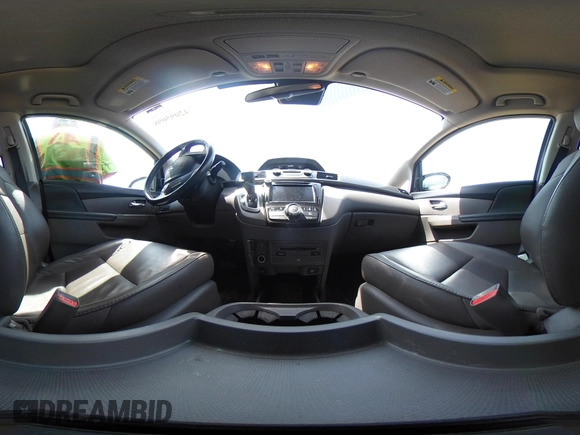 2014 Honda Odyssey Touring with VIN 5FNRL5H94EB079518, listed as a IAAI auction lot 42095098 with 141,019 mi miles and . Bid and sale history available at DreamBid. Image 19.