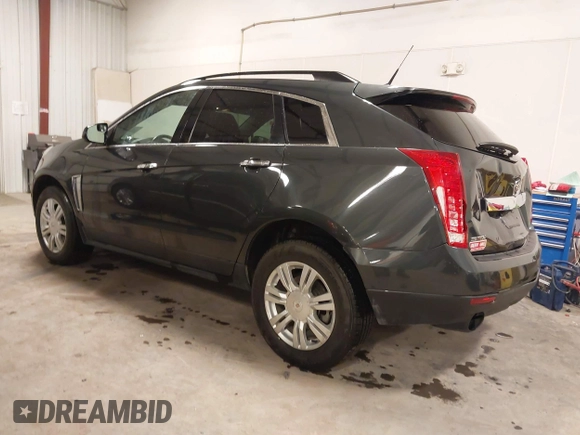 2014 Cadillac SRX with VIN 3GYFNAE34ES665630, listed as a IAAI auction lot 41315281 with 99,009 mi miles and . Bid and sale history available at DreamBid. Image 3.