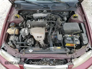 2000 Toyota Camry CE z VIN 4T1BG22K3YU649970, wystawiony jako Copart lot #55654425 z przebiegiem 220 076 mil mil oraz Szkoda całkowita • Salvage title. Historia ofert i sprzedaży dostępna na DreamBid. Obrazek 11.