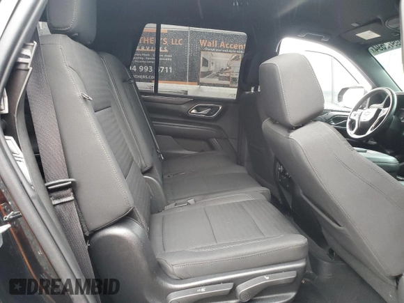 2021 Chevrolet Tahoe LS with VIN 1GNSCMKD4MR335973, listed as a Copart auction lot 69972594 with 42,129 mi miles and Salvage title. Bid and sale history available at DreamBid. Image 11.