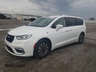 2021 Chrysler Pacifica Hybrid Touring L with VIN 2C4RC1L79MR596461, listed as a Copart auction lot 52144865 with 97,584 mi miles and Salvage title. Bid and sale history available at DreamBid. Image 1.