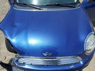 2012 MINI Hardtop z VIN WMWSU3C5XCT368997, wystawiony jako Copart lot #54622735 z przebiegiem 104 261 mil mil oraz Szkoda całkowita • Salvage title. Historia ofert i sprzedaży dostępna na DreamBid. Obrazek 11.