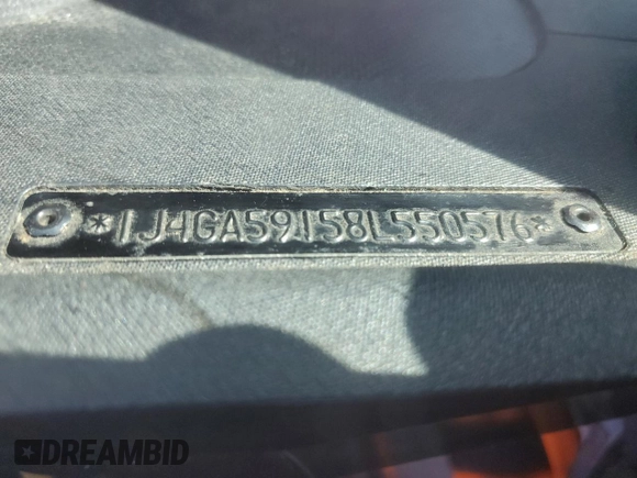 2008 Jeep Wrangler Unlimited Sahara with VIN 1J4GA59158L550576, listed as a Copart auction lot 53095565 with 208,434 mi miles and Salvage Title. Bid and sale history available at DreamBid. Image 12.