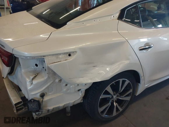 2017 Nissan Maxima SV with VIN 1N4AA6AP7HC434741, listed as a IAAI auction lot 40810102 with 80,187 mi miles and . Bid and sale history available at DreamBid. Image 18.
