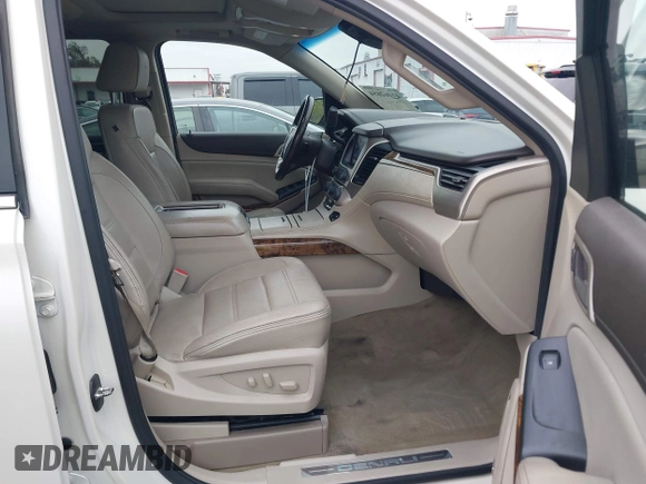2015 GMC Yukon Denali with VIN 1GKS2CKJ9FR294551, listed as a IAAI auction lot 42162654 with 106,063 mi miles. Bid and sale history available at carsss.com. Image 5.