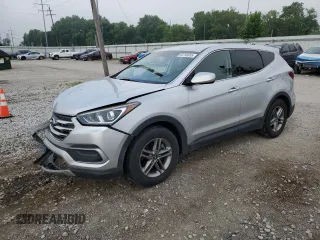 2018 Hyundai Santa Fe 2.4L with VIN 5XYZTDLB6JG566954, listed as a Copart auction lot 63746955 with 101,616 mi miles and Salvage title. Bid and sale history available at DreamBid. Image 1.