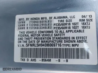 2013 Honda Odyssey Touring with VIN 5FNRL5H94DB069716, listed as a IAAI auction lot 41901369 with 243,492 mi miles. Bid and sale history available at carsss.com. Image 9.