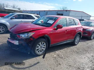 2016 Mazda CX-5 Touring with VIN JM3KE4CY5G0630438, listed as a IAAI auction lot 41877660 with 56,960 mi miles. Bid and sale history available at carsss.com. Image 20.