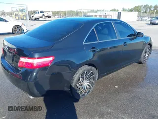 2009 Toyota Camry LE with VIN 4T1BK46K29U582722, listed as a IAAI auction lot 41868420 with 187,853 mi miles. Bid and sale history available at carsss.com. Image 4.