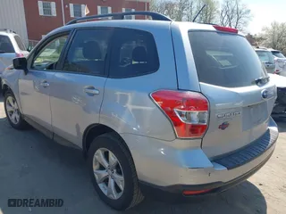 2015 Subaru Forester 2.5i Premium with VIN JF2SJADC2FH458859, listed as a IAAI auction lot 42104667 with 127,038 mi miles. Bid and sale history available at carsss.com. Image 3.