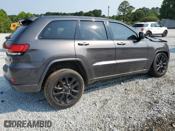 2018 Jeep Grand Cherokee Altitude with VIN 1C4RJEAG4JC145023, listed as a Copart auction lot 59001735 with 127,627 mi miles and Salvage title. Bid and sale history available at DreamBid. Image 3.