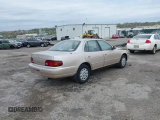 1996 Toyota Camry DX with VIN 4T1BG12K7TU813773, listed as a IAAI auction lot 42084977 with 49,453 mi miles. Bid and sale history available at carsss.com. Image 4.