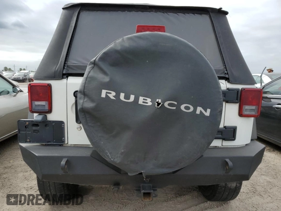 2009 Jeep Wrangler Rubicon with VIN 1J4GA64149L707142, listed as a Copart auction lot 76387344 with Not Provided miles and Salvage Title. Bid and sale history available at DreamBid. Image 6.