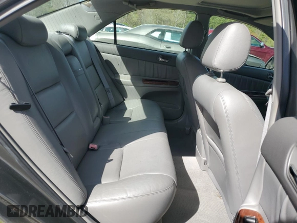2003 Toyota Camry LE with VIN 4T1BE30K43U724778, listed as a Copart auction lot 53515605 with 176,568 mi miles and Salvage Title. Bid and sale history available at DreamBid. Image 10.