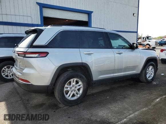 2023 Jeep Grand Cherokee Laredo with VIN 1C4RJHAG0PC674527, listed as a Copart auction lot 58538195 with 37,434 mi miles and Salvage title. Bid and sale history available at DreamBid. Image 3.