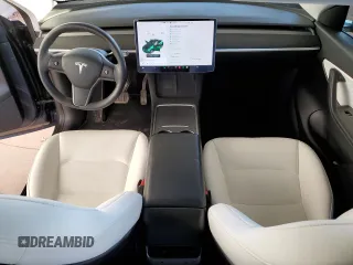 2021 Tesla Model Y Long Range with VIN 5YJYGDEEXMF151557, listed as a Copart auction lot 54936885 with 106,411 mi miles and Salvage Title. Bid and sale history available at DreamBid. Image 8.