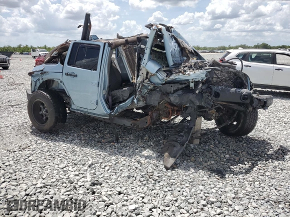2012 Jeep Wrangler Unlimited Sahara with VIN 1C4BJWEG8CL174402, listed as a Copart auction lot 51831805 with Not provided miles and Non repairable. Bid and sale history available at DreamBid. Image 4.