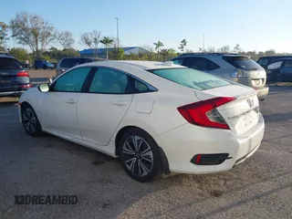2017 Honda Civic Sedan EX-L with VIN 19XFC1F75HE032229, listed as a IAAI auction lot 41456959 with 137,386 mi miles. Bid and sale history available at carsss.com. Image 3.