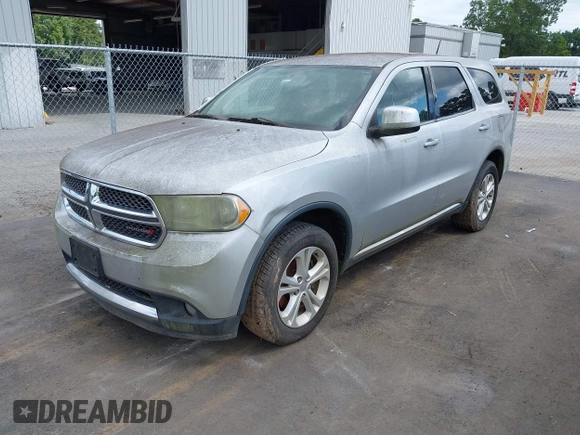 2013 Dodge Durango SXT with VIN 1C4RDHAG4DC571663, listed as a IAAI auction lot 42769759 with 178,033 mi miles and . Bid and sale history available at DreamBid. Image 2.