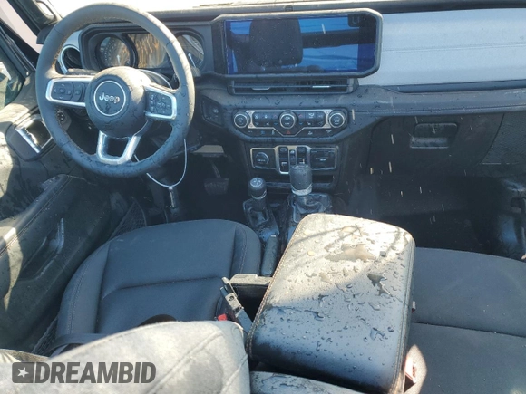 2024 Jeep Wrangler Sahara with VIN 1C4RJXP60RW257385, listed as a Copart auction lot 47660655 with 20,899 mi miles and Salvage title. Bid and sale history available at DreamBid. Image 8.